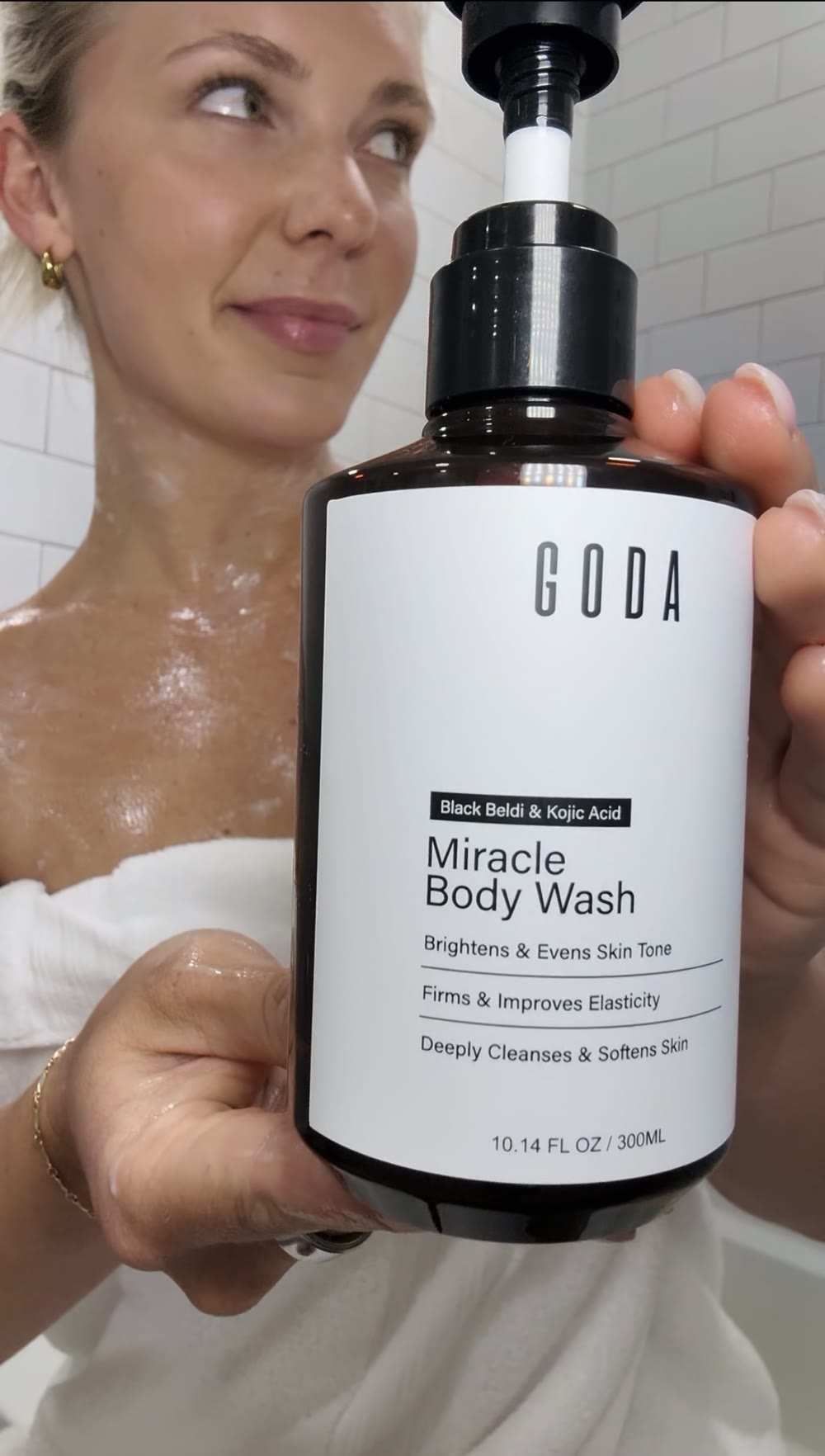 Molly holding GODA Miracle Body Wash